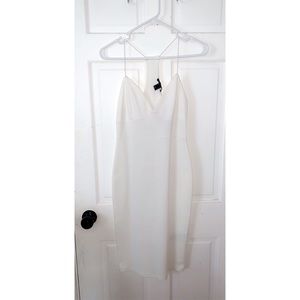 White bodycon dress.